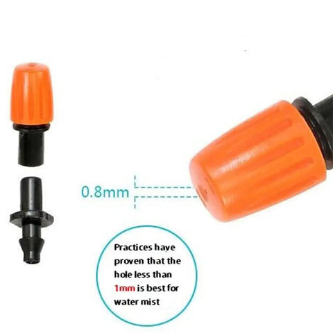Close-up of orange adjustable drip heads from 50 Piece Garden Micro Flow Drippers Sprinklers Emitter Set With Adjustable Drip Heads