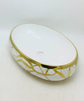 Sleek Gold Ceramic Vessel Sink Oval Bathroom Basin With Luxe Shine For Quick Vanity Upgrades Smooth Daily Routines And Fast Room Makeovers Turn Your Wash Setup Into A Total Flex side angle view with gold detailing