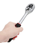 Hand holding ratchet from 94 Piece Ratchet Wrench And Socket Tool Set Kit For Mechanics Chrome Steel Durable Pro Grade in silver.