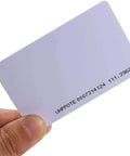 Person holding 125kHz Proximity RFID Card Read-Only for Access Control System and Time Attendance, Ultra Thin 0.8mm card close-up