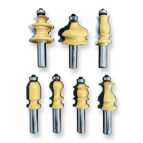Heavy Duty Architectural Molding Router Bit Set For Skilled Woodworkers Crafting Knockout Baseboards Door Casings And Chair Rails with 7 gold-coated router bits.
