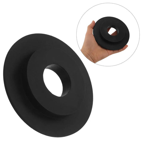 Close-up of a black Wheel Balancer Guard Panel with Drive Belt Cover And Durable Housing Shield for Tire Balancing Equipment