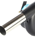 Close-up of Portable Manual Hand Crank Air Blower Fire Up Campfires Fast Heavy Duty Metal Stoker Bellows Pump nozzle.