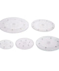 Five various sized acrylic lazy Susans on white background, featuring the Small 4 Inch Acrylic Lazy Susan Rotation Organizer
