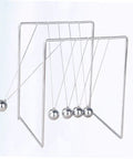 Pendulum Dynamics Energy Balance Desktop Decor Kit for physics learning, metal frame with swinging balance balls visible