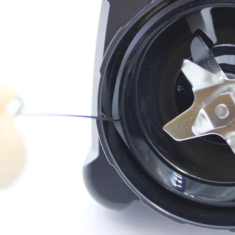 Top view of Replacement Ninja Blender Blade With Cup And Lid For Nutri Ninja BL610 And BL710WM showing stainless steel blade and housing.