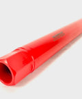 Side view of red 2-inch diamond wet core drill bit with plastic sleeve