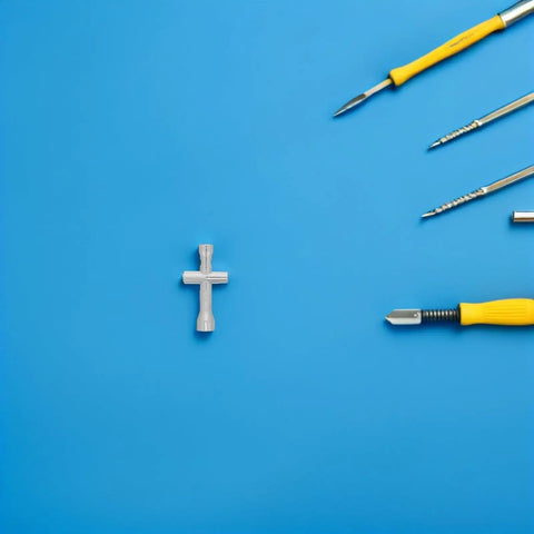 Mini Cross Socket Wrench Kit M2 M2.5 M3 For Rc Model Cars Hobby compact spanner on blue background with other tools.