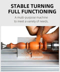 Front view of mini wood lathe turning an orange wooden spindle on a metal bed
