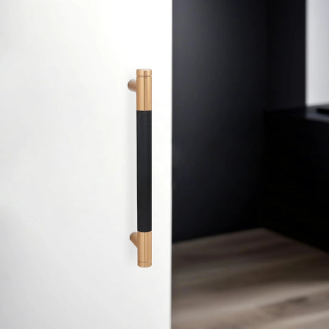 Matte Black And Champagne Bronze Knurled Cabinet Pulls Set Of 10 With 5 Inch Hole Centers installed on white cabinet door