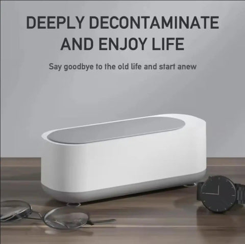 Pro Grade Ultrasonic Jewelry Cleaner For Rings Watches Eyeglasses Coins And Dentures With 47kHz High Frequency And 300ml Tank Digital Timer Easy Start Quick Clean For Silver Jewelry And Glasses on table with eyeglasses and watch
