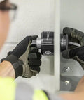 Electrician using Slug Buster Knockout Set For Two Inch Conduit K2BB-2 Replacement For 7211BB-2 with knurled grip