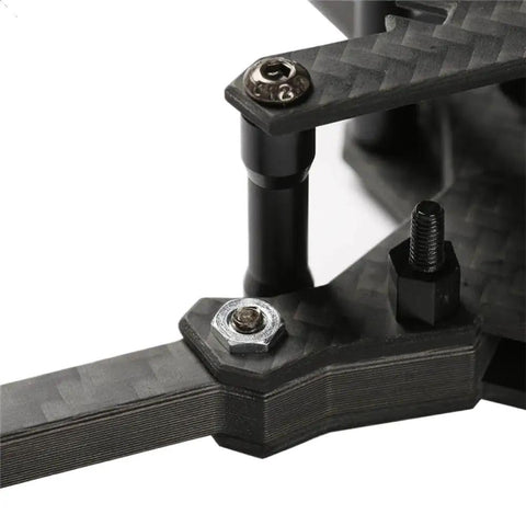 Dang Solid M3 Self Clinching Nuts For Rc Drone Fpv Frames And Quadcopter Sheet Metal Fasteners With Knurled Body To Lock Tight Under Vibration 40 Piece Set installation close-up on a carbon fiber frame.
