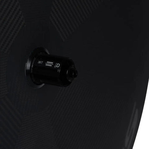 Close-up of Full Carbon Disc Wheel 700C Tubeless Road Rear Wheel Matte Finish 25mm Rim Shimano 8 9 10 11 Speed Compatible