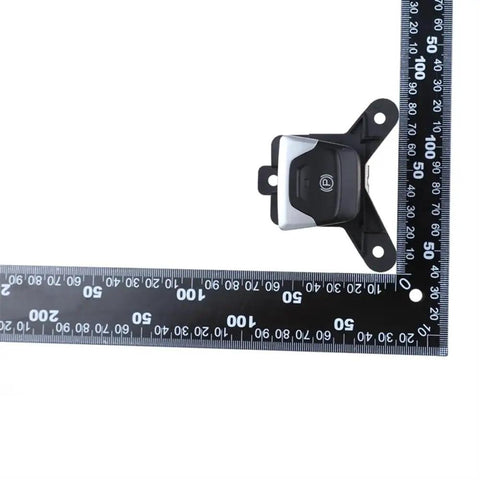 Straight Swap Electronic Parking Brake Actuator Switch For Jeep Compass 2017 To 2019 with measuring ruler for size reference.