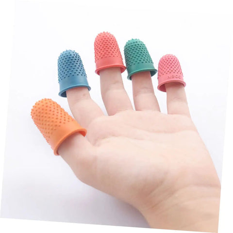 Colored neoprene finger sleeves on hand for grip, part of 30 Pack Neoprene Finger Sleeves Heat Resistant Protective Covers With Non Slip Grip Durable Work Gear For Mechanics No Sweat Protection For Tough Industrial Job Sites.