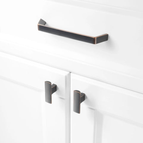 10 Pack 5 Inch Oil Rubbed Bronze Cabinet Pulls Set installed on white kitchen cabinet with smooth rounded corners solid metal hardware