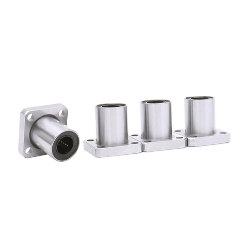 Front view of four LMK8UU square flange linear bearings, 8x15x24mm, stainless steel.