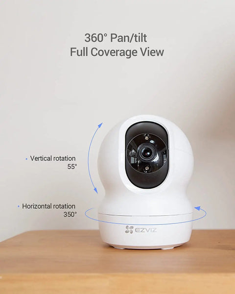 2K Plus Indoor Security Camera With 360 Degree Coverage, 4MP Night Vision, Auto Motion Tracking on wooden table