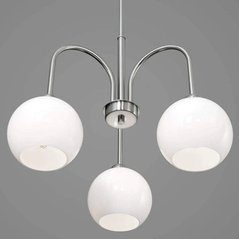 Carisa Three Light Chandelier in brushed nickel with glossy white glass globes hanging from ceiling.