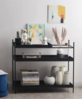 Top Shelf Iron Industrial Bookshelf Featuring a Sleek Narrow Frame Ideal for Living Room Entryways and Foyer Organization Multi Level Floor Storage Rack Totally Built Different with decor and plants.