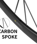 Close-up of Ultra Light Carbon Road Disc Wheelset with Tubeless Setup and Carbon Spokes, featuring smooth ratchet system hub.