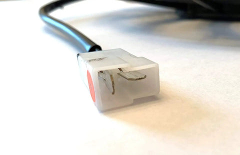 Top Shelf Dual Pack 12 Inch Electric Puller Radiator Cooling Fans Featuring Curved Blades 12 Volt connector close-up showing terminals.