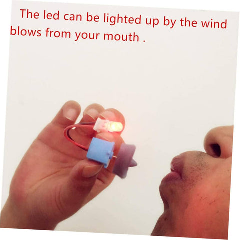 Portable Mini Wind And Hydro Generator Dual Powered Educational Kit demonstrating wind power LED light activation.