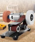 Rock Solid Mini Belt Sander Boasting 7 Easy Speed Gears For Quick Polishing And Sharpening Plus An Integrated Knife Sharpener For Wood And Metal Hobbyists on a workbench with sanding wheels.