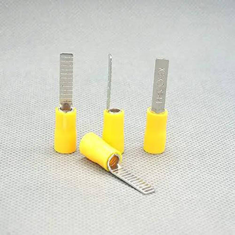 Yellow 5.5-18 Electric Crimp Ferrule Blade Terminal for 4-6 MM2 wires, showing four heavy-duty connectors standing on a surface.