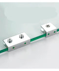 Close-up of 16 Piece Cabinet Shelf Clips Zinc Alloy Glass Clamp Holders on glass shelf