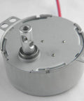 CHANCS TYC-50 small synchronous motor with metal housing, mounting tabs and protruding shaft