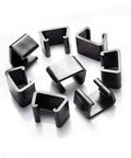 10 Pack Garden Furniture Clips For Wicker And Rattan Chairs arranged in a circle, showing black plastic clips for securing outdoor furniture connections.