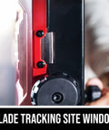 Blade tracking site window on 2.8 Amp 9 Inch Benchtop Band Saw for Woodworking, featuring precision ball bearing guides.