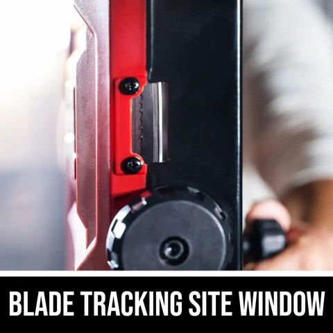 Blade tracking site window on 2.8 Amp 9 Inch Benchtop Band Saw for Woodworking, featuring precision ball bearing guides.