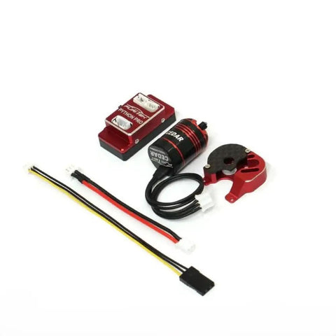 Beefed Up Brushless Power System For TRX4M RC Car Crawler One Eighteen Scale Upgrade Electronics With Rugged Waterproof Dustproof Enclosure And High Performance ESC, visible are components including Python Pro ESC and Cedar inrunner motor, with wiring and red enclosure on white background.