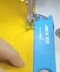 3 In 1 Quick Threading Device For Sewing Machines With Magnifying Lens And Precision Guide, close-up of threading action on fabric