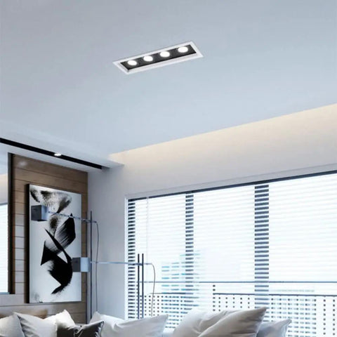 Top Shelf Quad Head Gimbal Recessed Lights 4 Pack Swivel Led Spotlights with sleek glare-free design in modern interior.