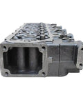 4D34 Cylinder Head ME997799 Direct Bolt In Replacement For 4D34 Engine Series In Heavy Duty Trucks OEM Quality Match To Factory Specs Ready To Get Your Ride Back. cast metal cylinder head shown from front angle