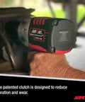 No-Bull Heavy-Duty Pneumatic Impact Wrench Pushing 1450 Foot Pounds Killer Torque And Vibrotherm Low-Vibration Composite Build For Tough Job Site Grinds in use with a focus on the patented clutch.