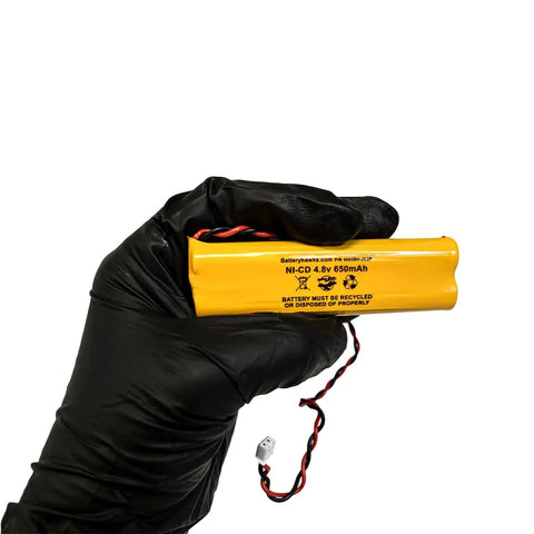 Hand holding Five Pack Ni Cad AA 650mAh Rechargeable Battery Pack For Exit Signs And Emergency Lights 4.8V All Fit E1021R D AA650B 4