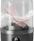 Portable Mini Washer Ultra Compact Wash Tub For Underwear And Socks Hella Quick Stain Removal Ultra Silent Operation with a pink cloth soaking.
