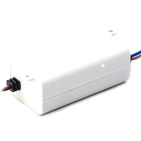 Slick 24V DC LED Power Supply Driver With Bulletproof Class 2 Safety And Foolproof Hiccup Recovery Housed Inside A Hassle Free Fanless Ultra Slim Case Made For LED Strips And Decorative Projects That Run Smooth As Silk, compact white unit with wires.