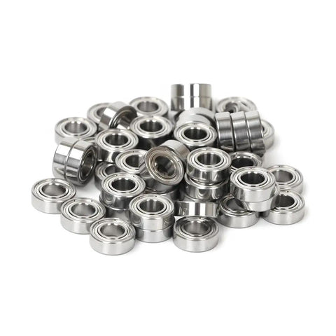 Five Pcs Premium R144 ZZ Miniature Deep Groove Ball Bearings arranged in a pile, made of high quality steel, ideal for small motors.