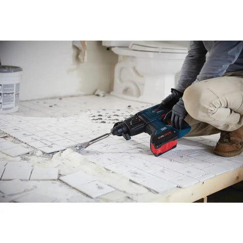 Person using Lightweight 18V Brushless SDS Plus Bulldog Rotary Hammer Bare Tool With Three Quarter Inch Chuck for tile removal