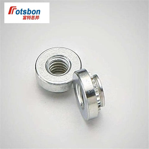 Hardcore Self Clinching Rivet Nuts One Thousand Piece Bulk Pack Top Shelf Stainless Steel Threaded Panel Inserts for Server Racks and PCBs, close-up of two stainless steel rivet nuts.