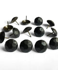 Sixty Piece Bundle Of Hella Sturdy Matte Black Upholstery Tacks Featuring A Slick One Inch Round Head Built For Sofas And Headboards A Top Shelf Boost For Furniture Flips No Fuss Installation Everyday, showing a close-up of matte black upholstery tacks.