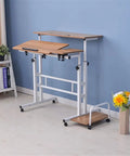 Adjustable Height Portable Laptop Table With Easy Roll Casters And Hidden Storage Shelf Folding Sofa Bed Tray Heavy Duty Steel Frame Mobile Standing Desk For Dorm Room No Hassle Workspace against a blue wall.