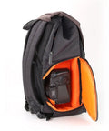 Side view of large capacity camera backpack with rain cover waterproof fabric for 15.6 inch laptop and DSLR, open with camera inside.