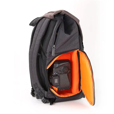 Side view of large capacity camera backpack with rain cover waterproof fabric for 15.6 inch laptop and DSLR, open with camera inside.